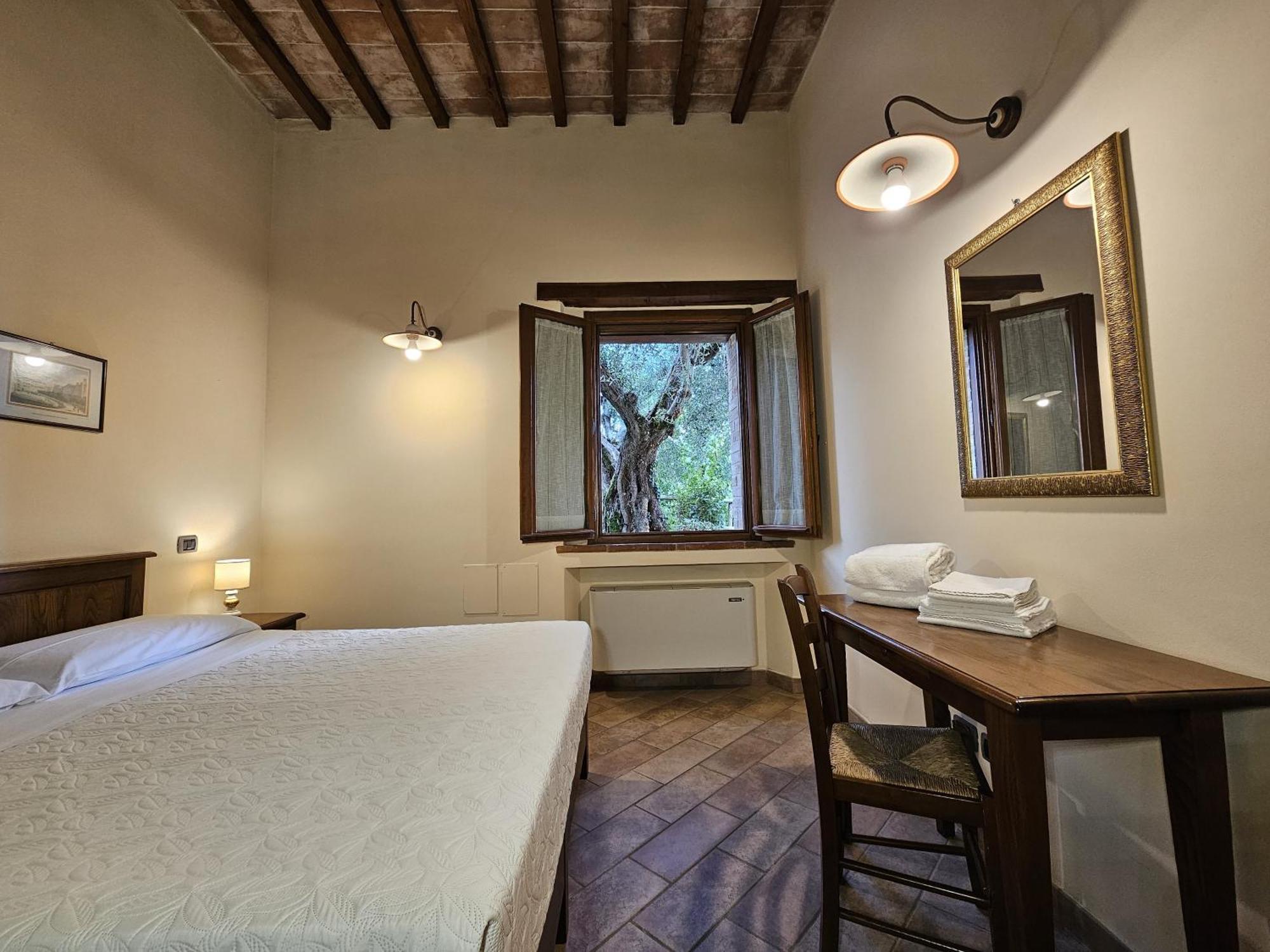 Vila La Fonte Di Montebuono Magione Pokoj fotografie